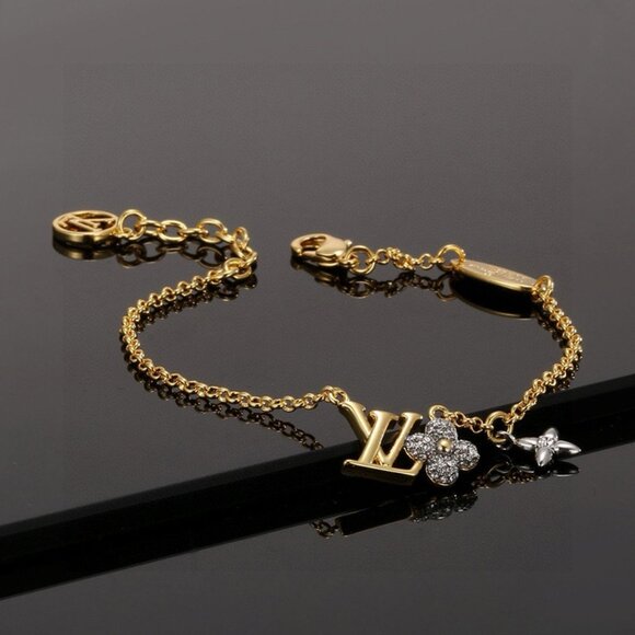 Louis Vuitton Gold-Tone Alphabet Bracelet - Picture 1 of 6